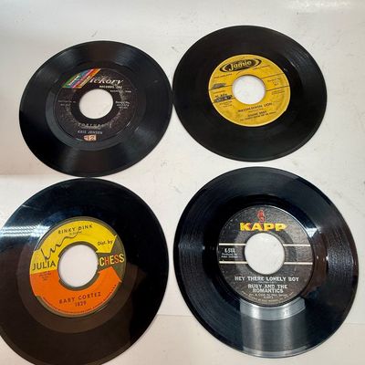 Sale Photo Thumbnail #419: The rack is in very good condition, the case is in fair condition with lots of writing, and the records range in condition from poor to good condition. Also 3 spindle spacers included.