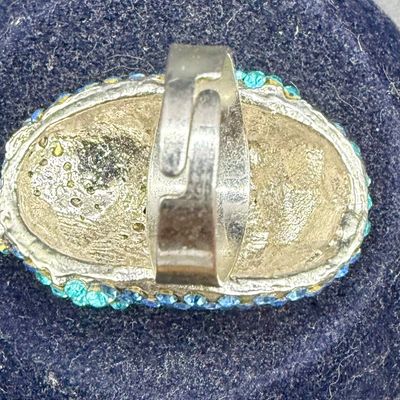 Sale Photo Thumbnail #561: Silvertone adjustable statement ring, good condition.