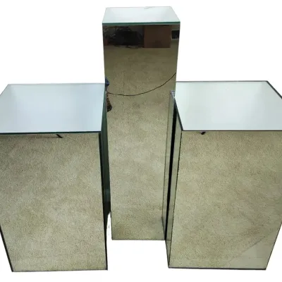 Three Mirrored Display Pedestal Stands in Graduated Sizes