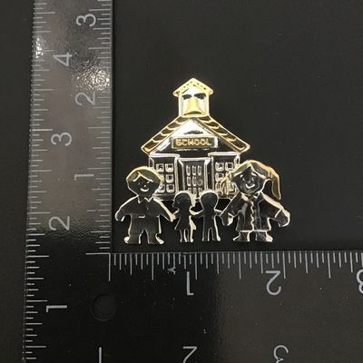 Cute silver tone school brooch/pendant