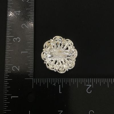 Pretty silver tone fashion brooch
