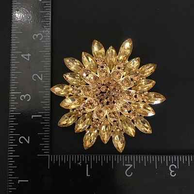 Large beautiful gold tone rhinestone brooch