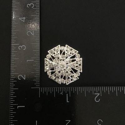 Pretty silver tone fashion brooch