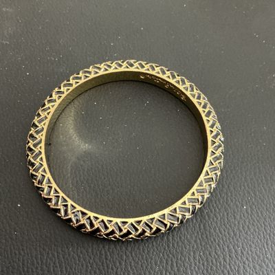 Gold Tone Lilly Pulitzer bangle bracelet with black enamel