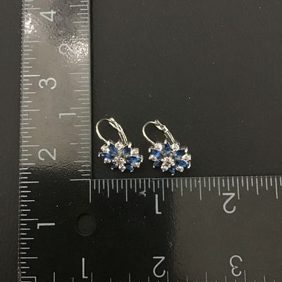 Beautiful silver toned light blue Crystal Rhinestone flower earrings