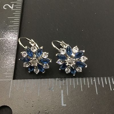 Beautiful silver toned light blue Crystal Rhinestone flower earrings