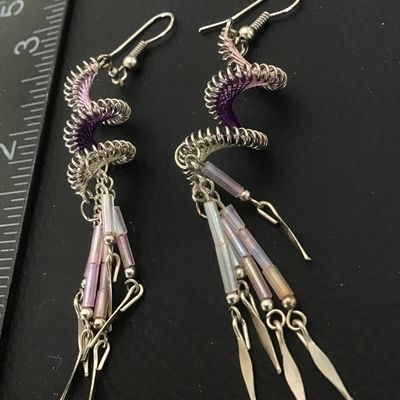 Beautifully hand crafted spirally silver toned dangle earrings