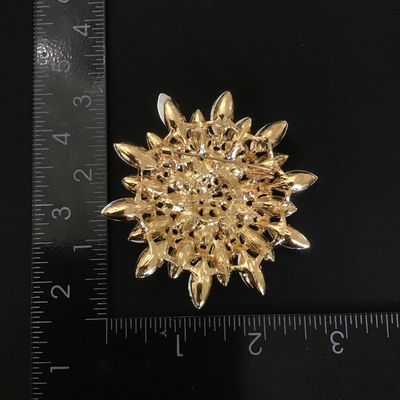 Large beautiful gold tone rhinestone brooch