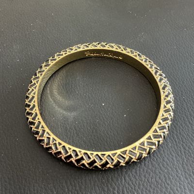 Gold Tone Lilly Pulitzer bangle bracelet with black enamel
