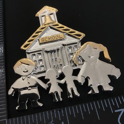 Cute silver tone school brooch/pendant