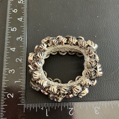 Gorgeous silver tone rose stretchy bracelet