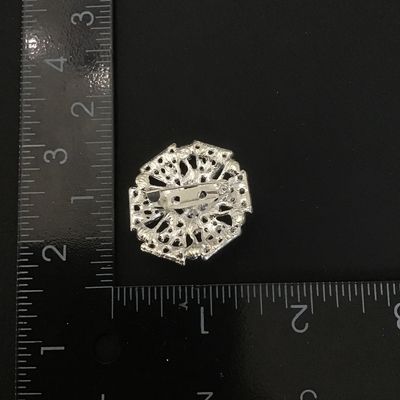 Pretty silver tone fashion brooch