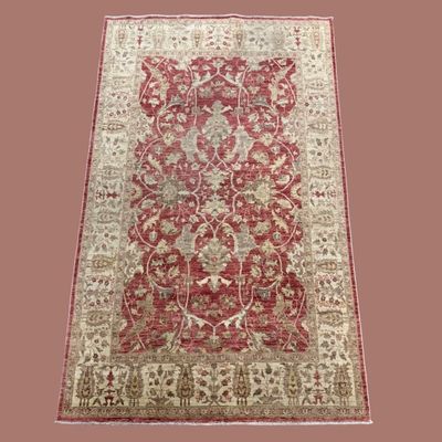 Ivory and burgundy traditional rug with ornate botanical design