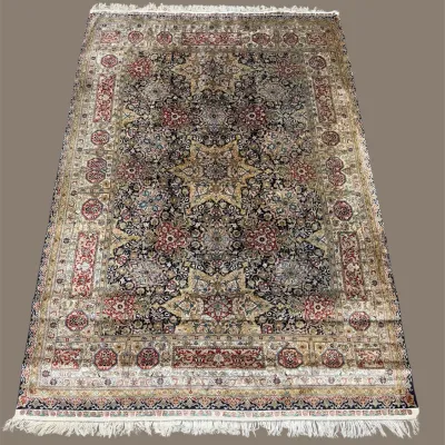 Distressed-style area rug with soft multicolor pattern