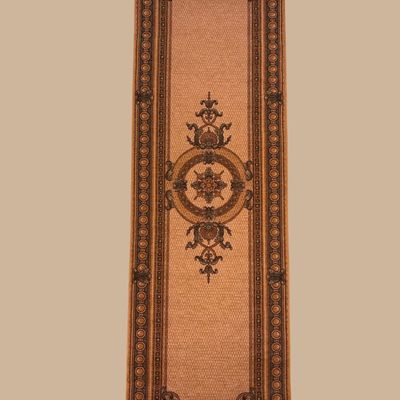 Warm rust-toned runner with elegant central medallion motif