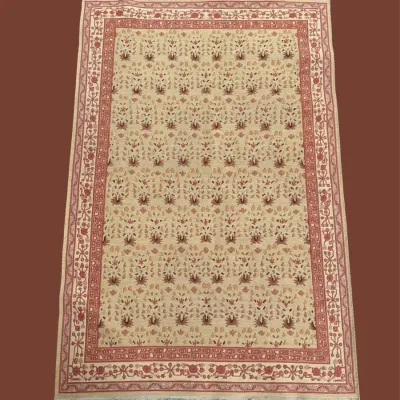 Traditional rectangular rug with detailed red border