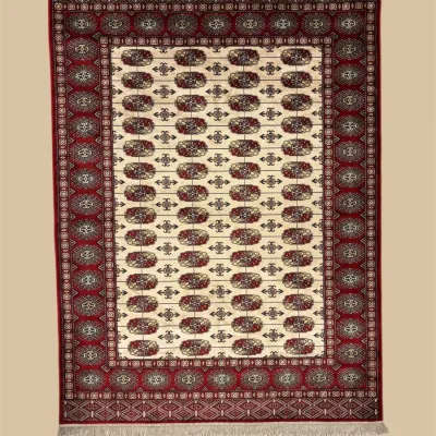 Ivory and burgundy traditional area rug with repeating medallion pattern
