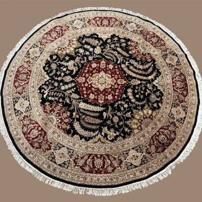 Round traditional rug with ornate central medallion