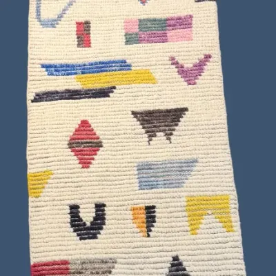 Contemporary ivory rug with colorful abstract geometric motifs