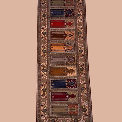 Long multicolor runner with patchwork-style geometric design