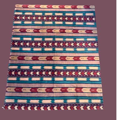Colorful striped flatweave rug with red, blue, ivory, and geometric accents