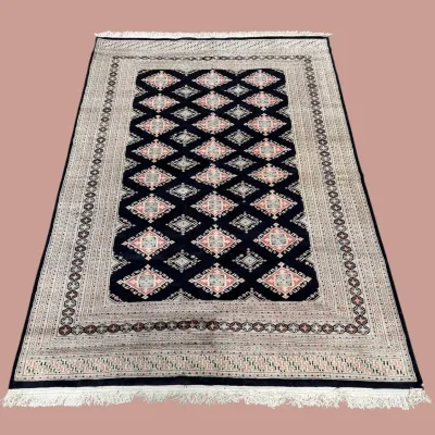 Black and ivory geometric patterned rug