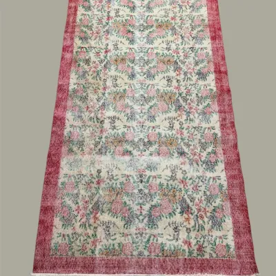 Distressed multicolor runner rug with red border