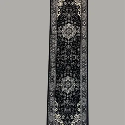 Long black runner rug with repeating floral medallions