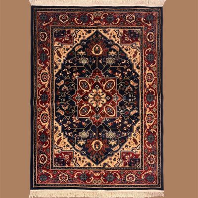 Dark navy traditional area rug with bold central medallion and ornate border