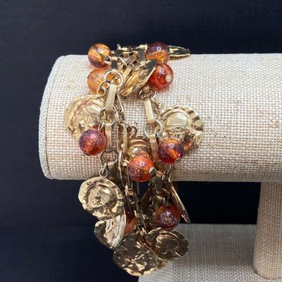 LOT 10: Large Collection of Assorted Style Gold Tone Bracelets