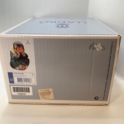 LOT 101: Lladro "Pensive Esquimo Girl" No. 2158 with Original Box