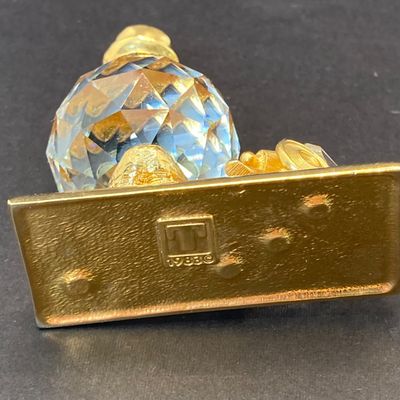 LOT 109: Lenox Desk / Table Clock, Crystal / Gold Tone Fish and Trimlite Strass Clown with Cannon Figurines