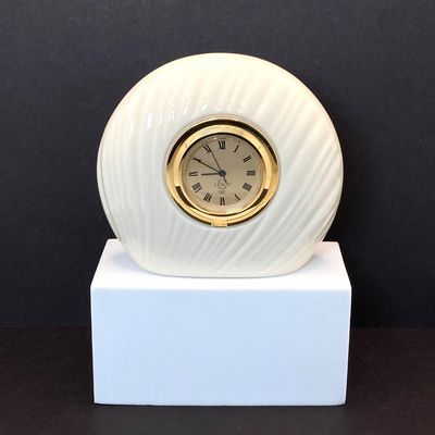 LOT 109: Lenox Desk / Table Clock, Crystal / Gold Tone Fish and Trimlite Strass Clown with Cannon Figurines