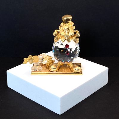 LOT 109: Lenox Desk / Table Clock, Crystal / Gold Tone Fish and Trimlite Strass Clown with Cannon Figurines