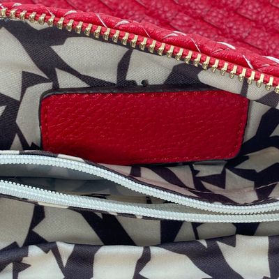 LOT 118: Red Woven Faux Leather Clutch / Crossbody Bag with Wrist Strap