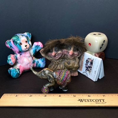 LOT 110: NyForm - The Original Trolls, Jay Strongwater Elephant, Onyx Dice and More