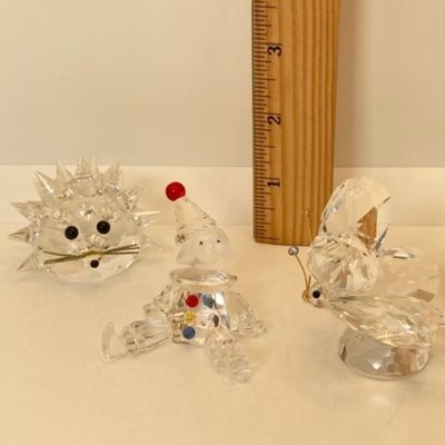LOT 108: Collection of Swarovski Crystal Small Figurines - Butterfly, Porcupine and Clown