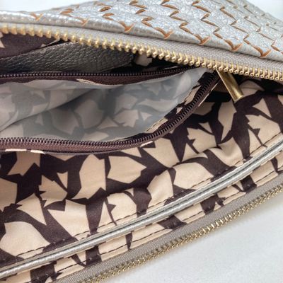 LOT 117: Silver Woven Faux Leather Clutch / Crossbody Bag with Wrist Strap