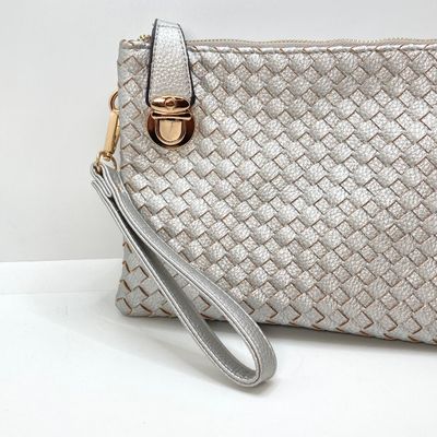 LOT 117: Silver Woven Faux Leather Clutch / Crossbody Bag with Wrist Strap
