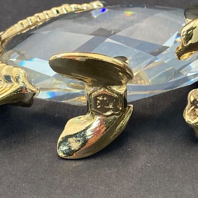 LOT 109: Lenox Desk / Table Clock, Crystal / Gold Tone Fish and Trimlite Strass Clown with Cannon Figurines