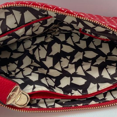 LOT 118: Red Woven Faux Leather Clutch / Crossbody Bag with Wrist Strap