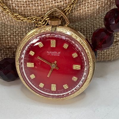 LOT 32: Gold Tone Statement Necklaces, Namruf Swiss Made 17 Jewels Necklace Watch and More