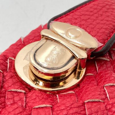 LOT 118: Red Woven Faux Leather Clutch / Crossbody Bag with Wrist Strap