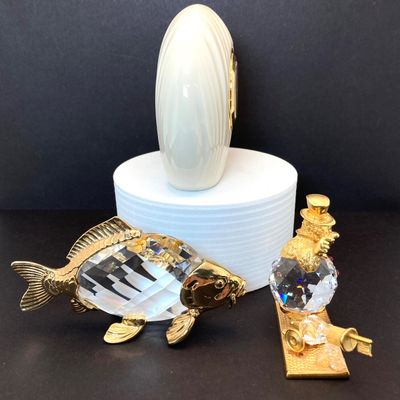 LOT 109: Lenox Desk / Table Clock, Crystal / Gold Tone Fish and Trimlite Strass Clown with Cannon Figurines