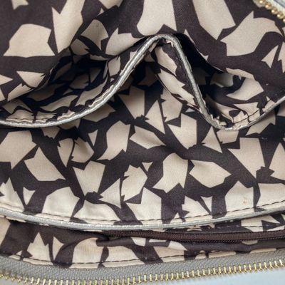LOT 117: Silver Woven Faux Leather Clutch / Crossbody Bag with Wrist Strap