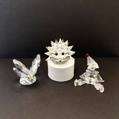 LOT 108: Collection of Swarovski Crystal Small Figurines - Butterfly, Porcupine and Clown