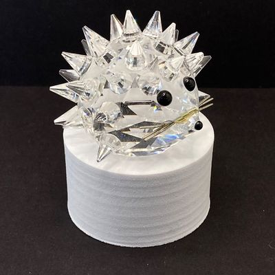 LOT 108: Collection of Swarovski Crystal Small Figurines - Butterfly, Porcupine and Clown
