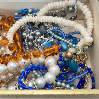 LOT 25: Vintage El Producto Box filled with Craft Jewelry and More