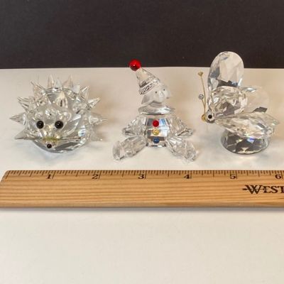 LOT 108: Collection of Swarovski Crystal Small Figurines - Butterfly, Porcupine and Clown
