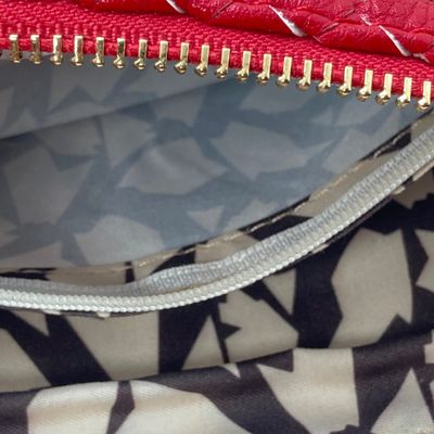 LOT 118: Red Woven Faux Leather Clutch / Crossbody Bag with Wrist Strap